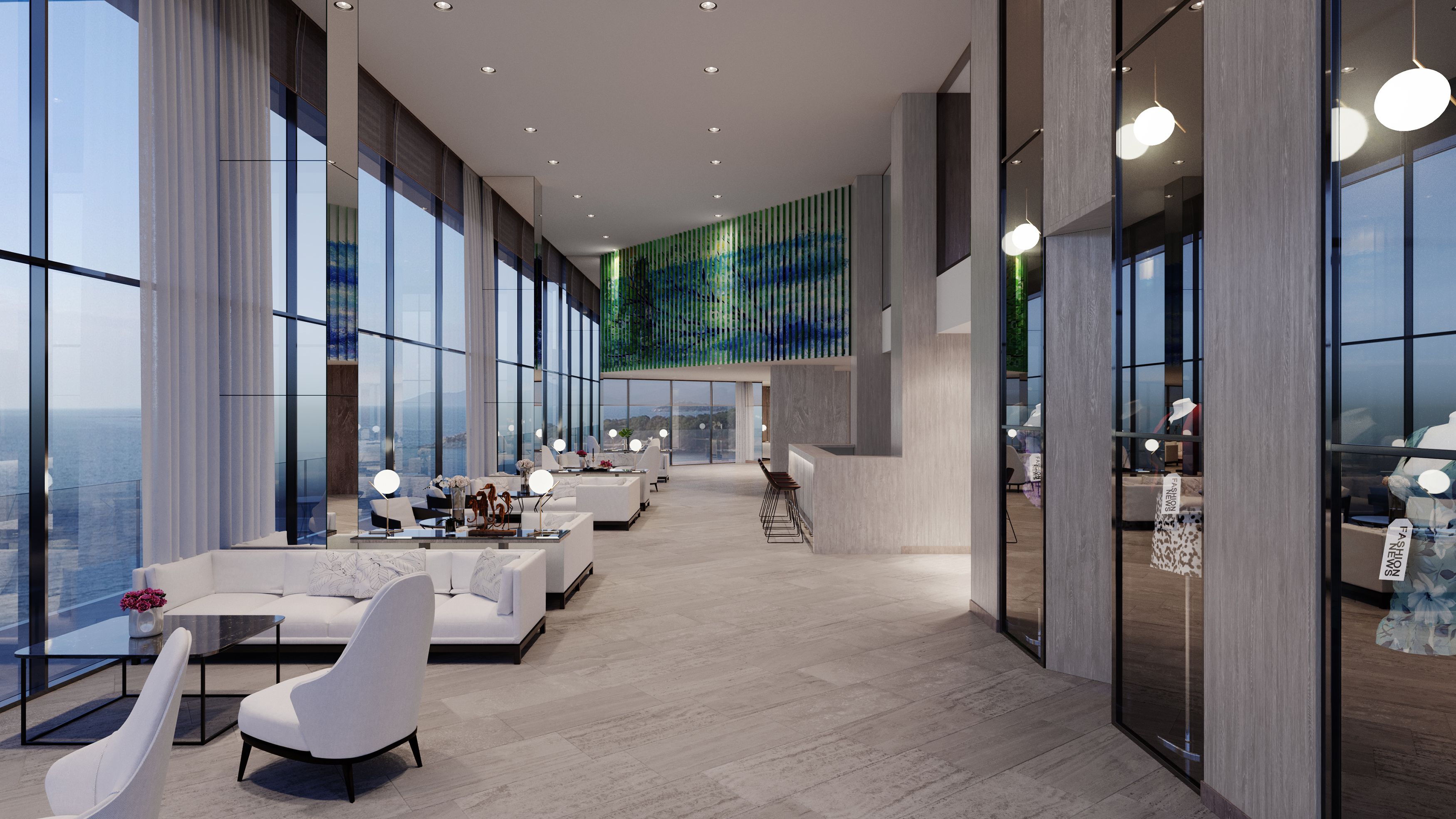 Modern lounge with white sofas and floor-to-ceiling windows overlooking the ocean